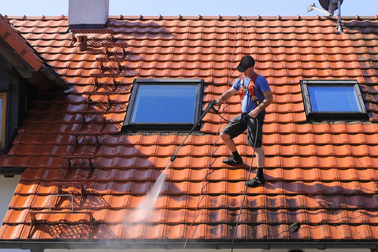 The Fraserman mascot, giving pressure washing his personal thumbs-up